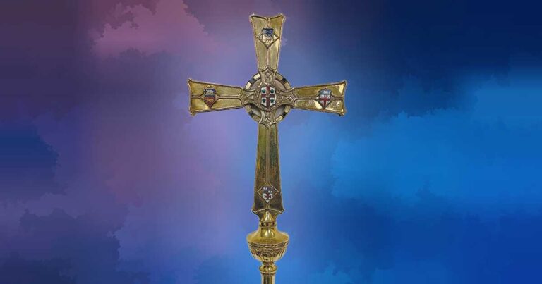 The Primatial Cross of a blue background