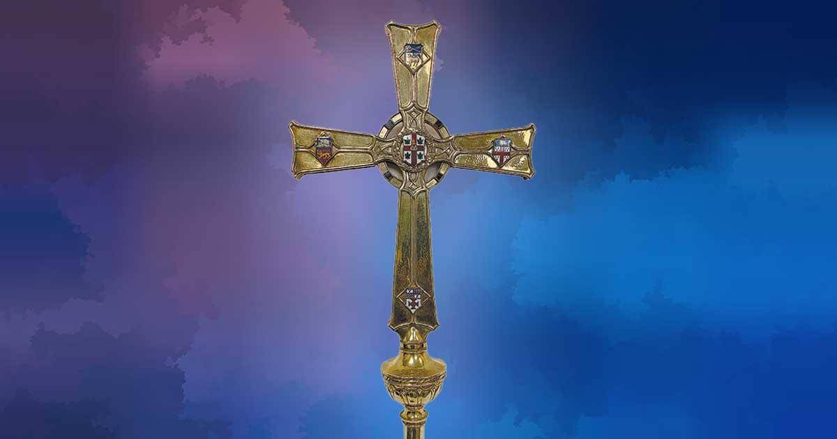 The Primatial Cross of a blue background