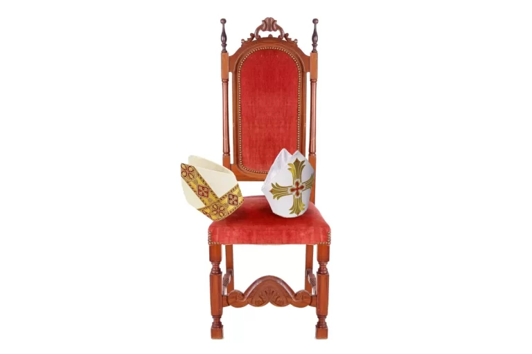 Illustration of a bishop's throne with two mitres on the seat.